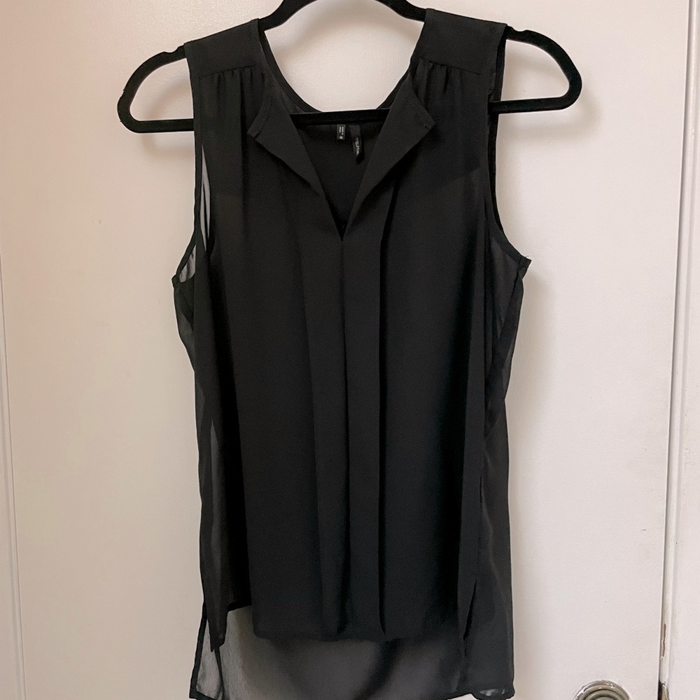 Sheer black top. Not lined. Great for office or date night.